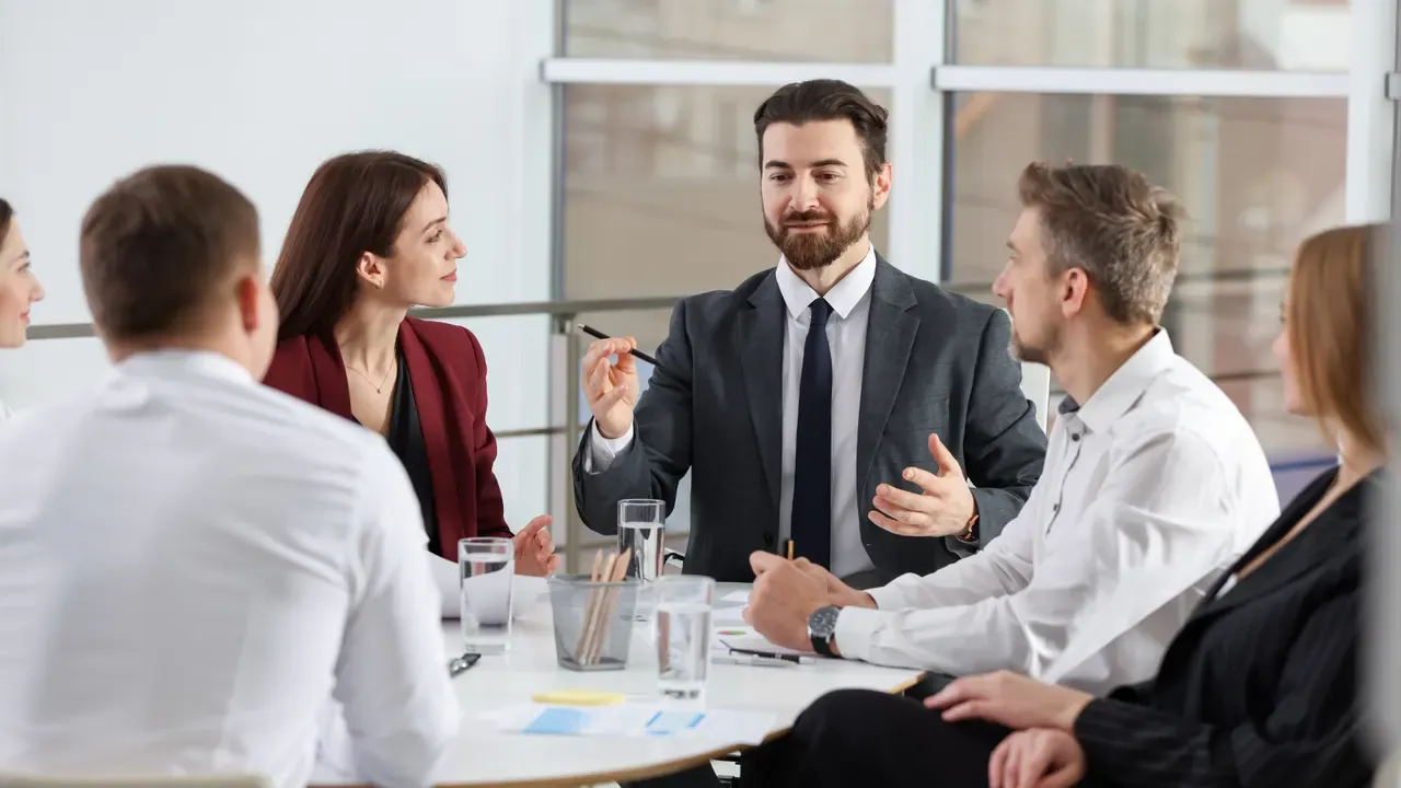 A leader guiding a team discussion