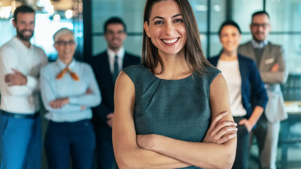 A leader with her team