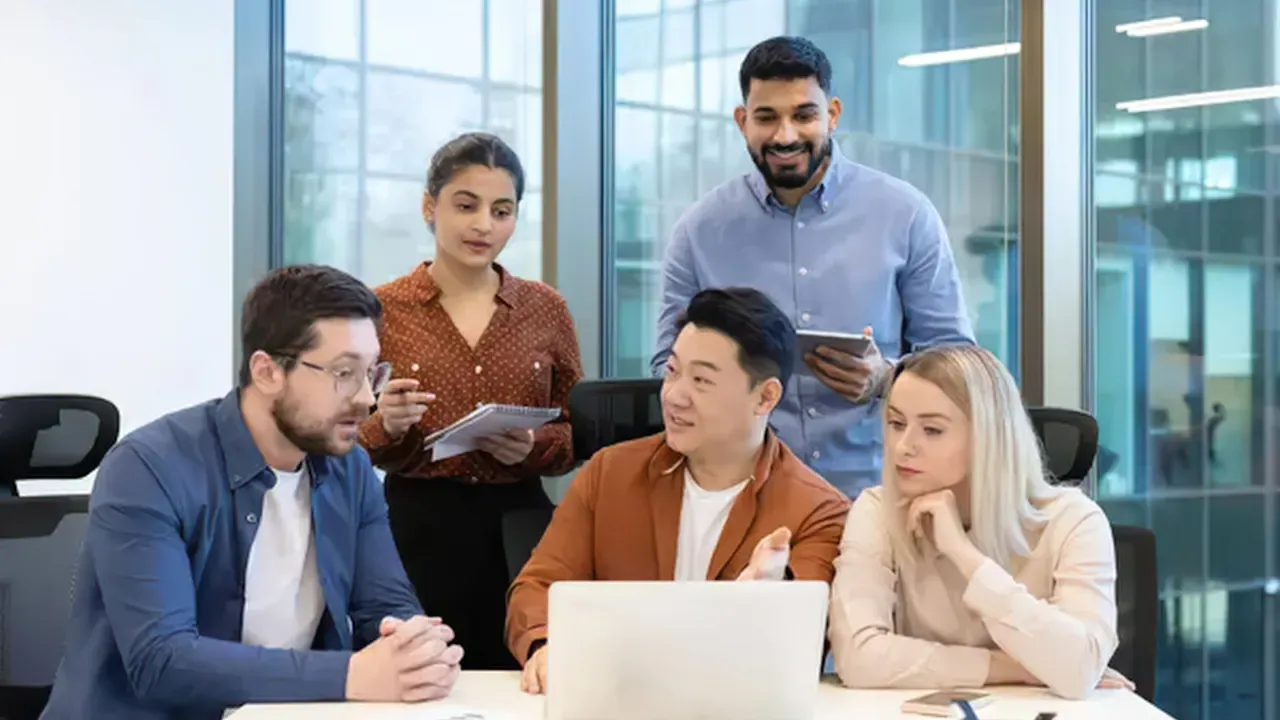 A leadership team planning how to adopt AI
